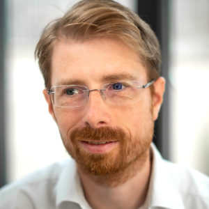 Head shot of James Daglish looking away from camera