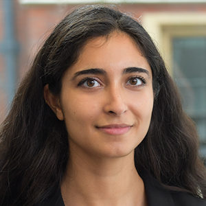 Head shot of Anahita Shahrokh smiling into camera