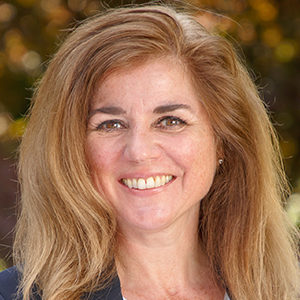 Headshot of Tracy Sell-Peters looking at the camera